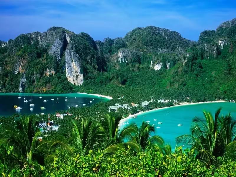 Speedboat touring both Maya Bay on Phi Phi Islands and James Bond Island in one day from Phuket.