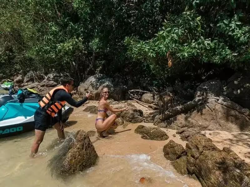 Meeting the local monkeys on Monkey Island during a Phuket jet ski adventure
