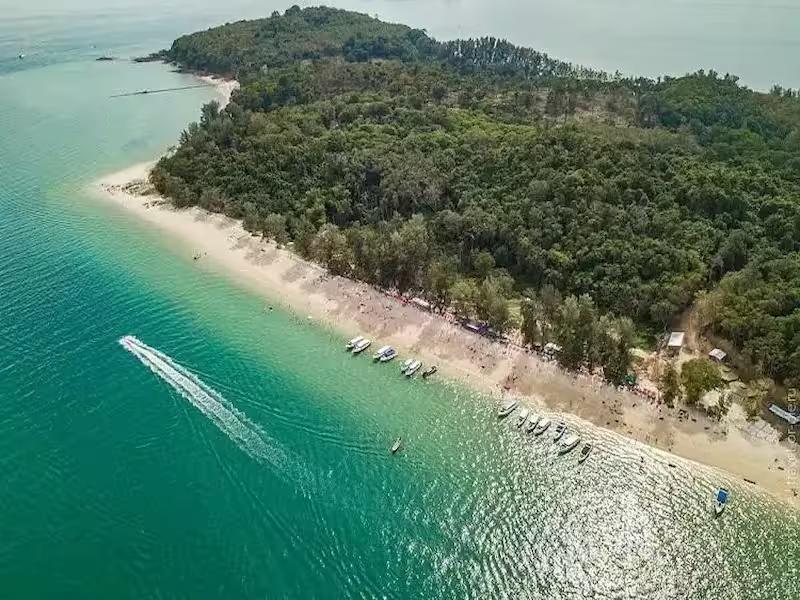 Beautiful beach stop at Naka Yai Island during a Phuket jet ski adventure tour