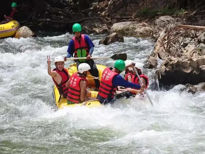 Exciting white water rafting adventure on a river in Phang Nga, Thailand