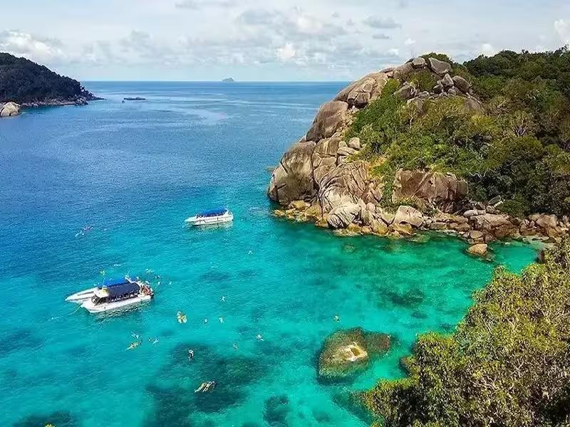 The dramatic granite boulders and clear blue water surrounding Koh Payu (Island #7), Similan Islands
